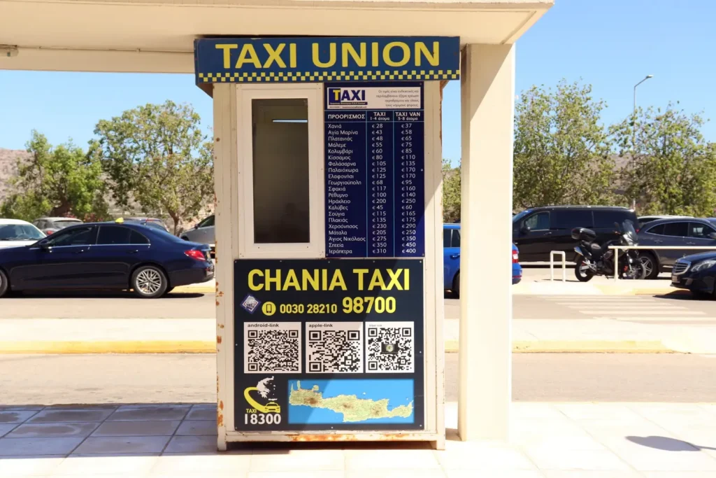 Chania Airport taxi stand with price list and contact information