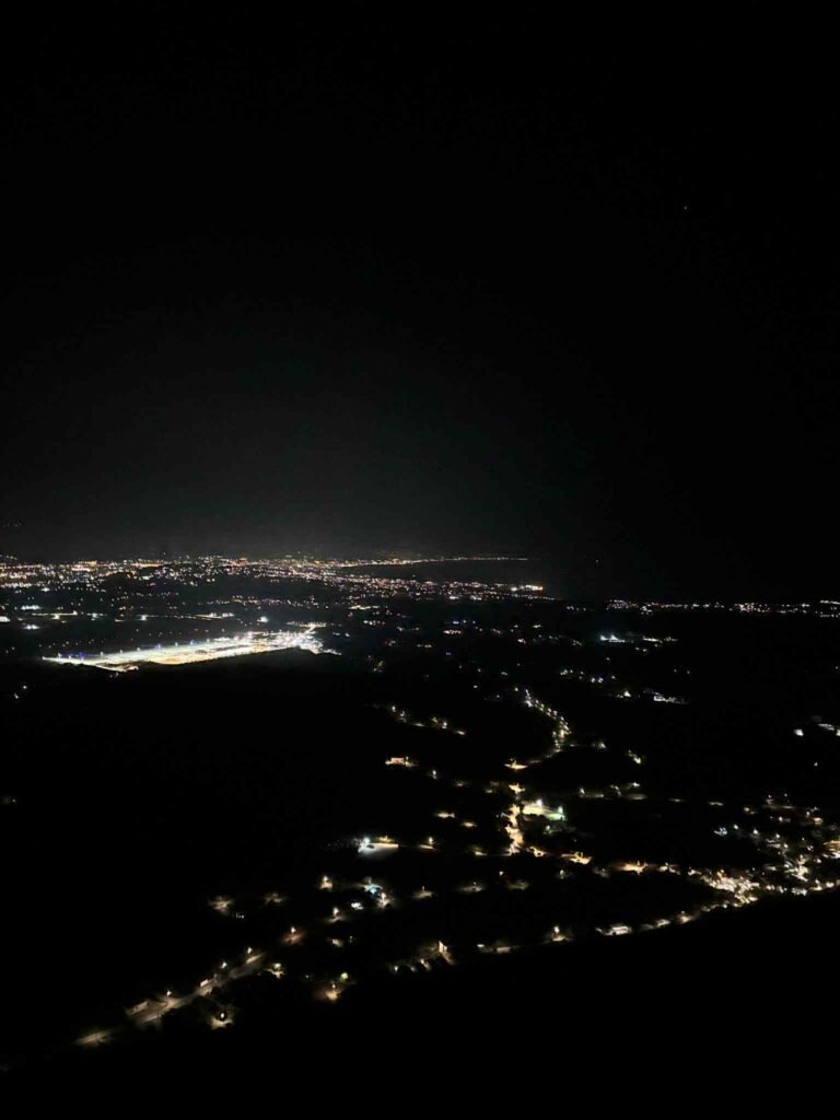 Night view of Chania from Venizelos Graves — city lights and coastline (Crete)