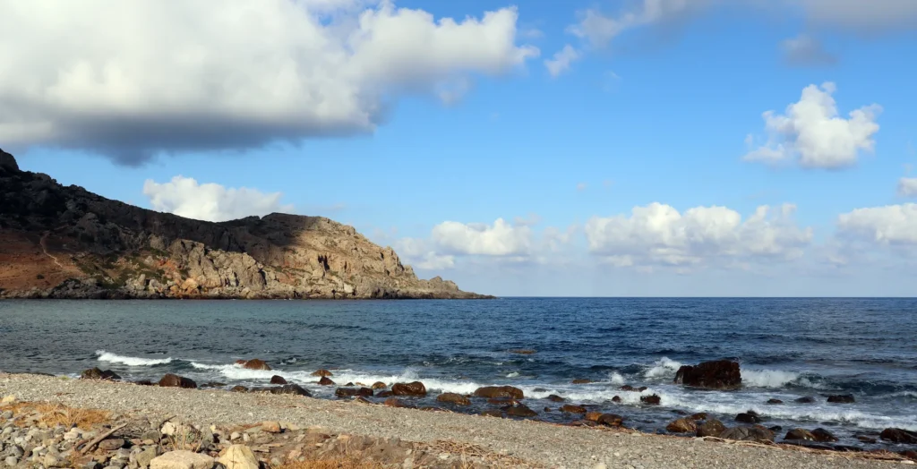 Agia Pelagia Beach in Crete with golden sand and calm blue sea