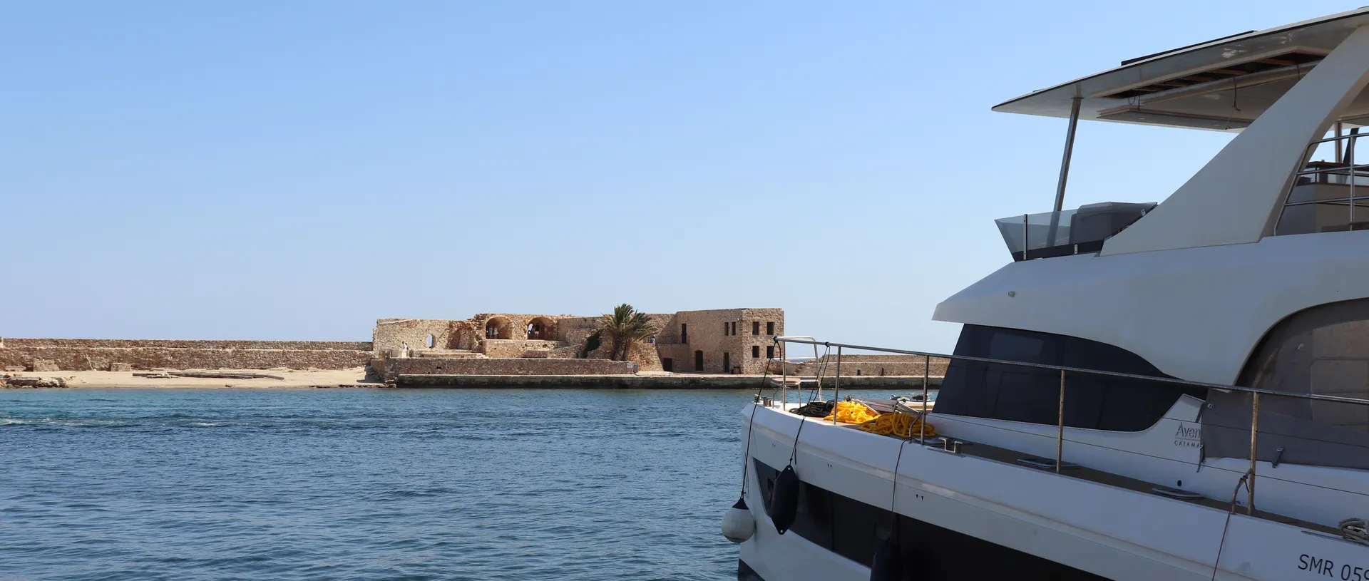 Walkway near Pallas Restaurant with views of Chania Harbor