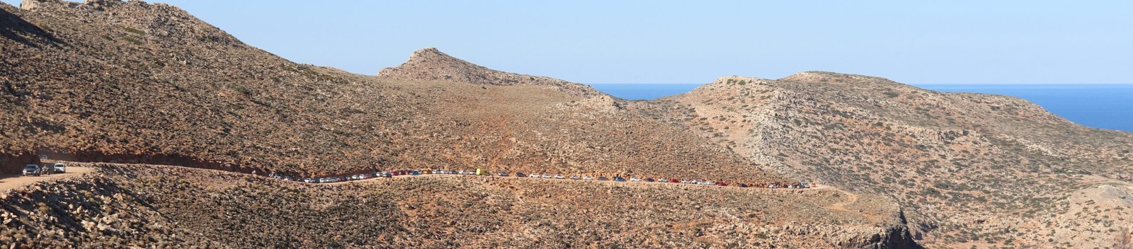 Cars waiting on road to Balos parking — Gramvousa, Crete