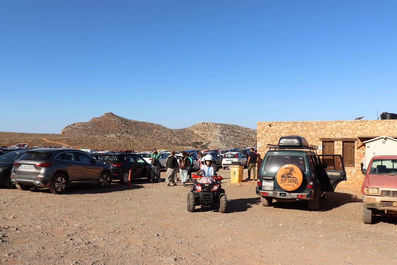Motorbike and quad leaving Balos parking — Gramvousa, Crete