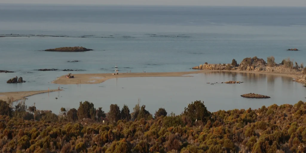 Elafonissi Beach Crete – pink sand lagoon at golden sunset, southwest Crete