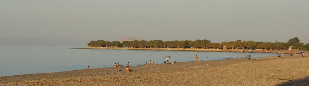 Marathi Beach, Chania — temporary panoramic image of the calm golden beach at sunset © CreteTales.com