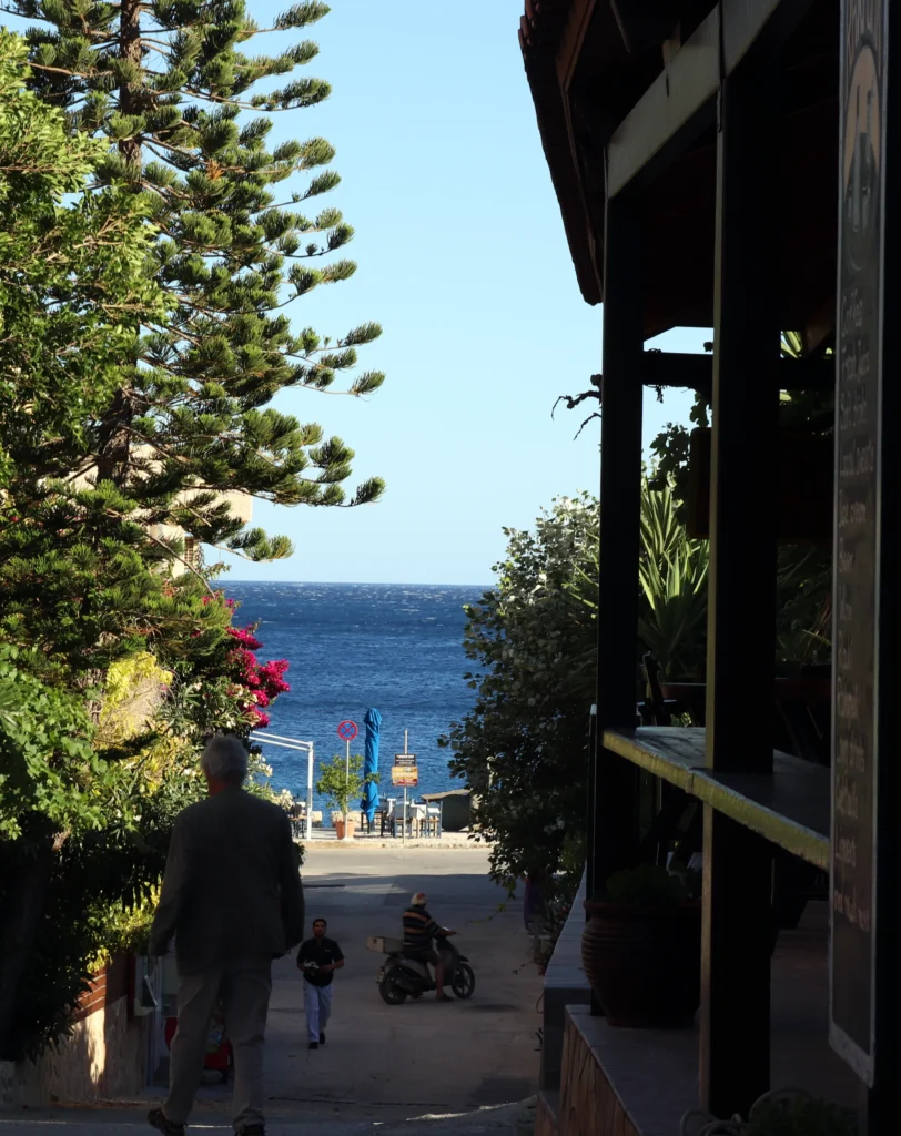 Quiet street leading to Sougia Beach with the Libyan Sea in the background