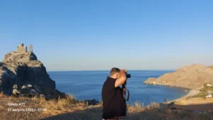 Zurab Peikrishvili photographing Crete landscape at sunset