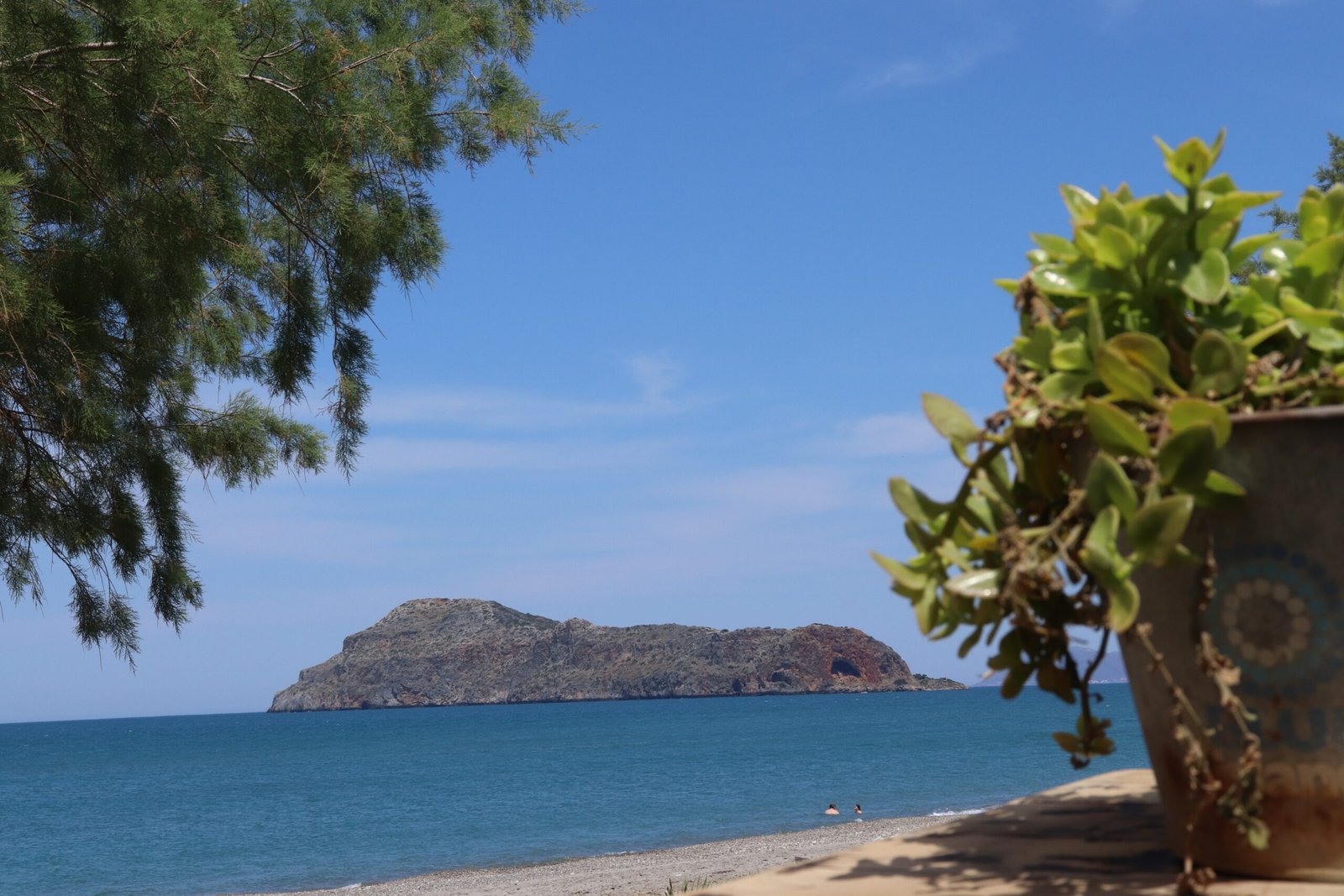 Agii Theodori Island view from Ayia Marina Beach on a sunny day