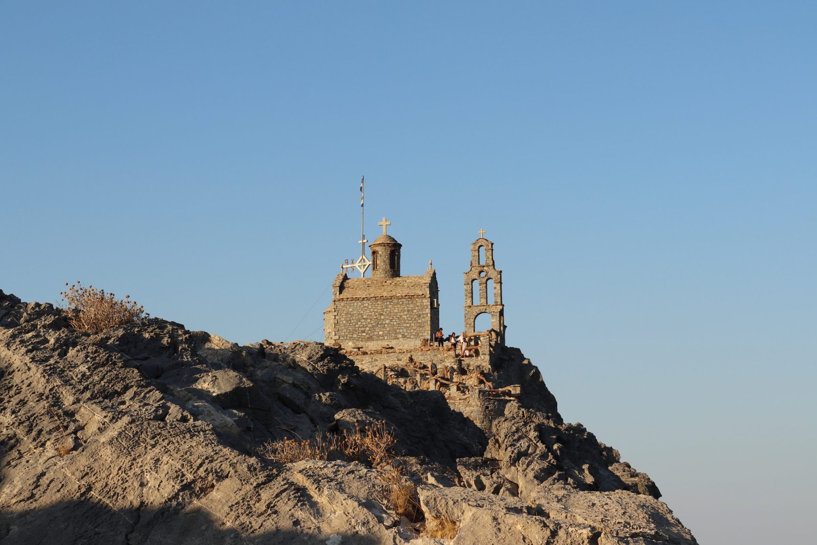 Agios Paisios Church standing on the rocky hill above Damnoni and Ammoudi beaches near Plakias Crete