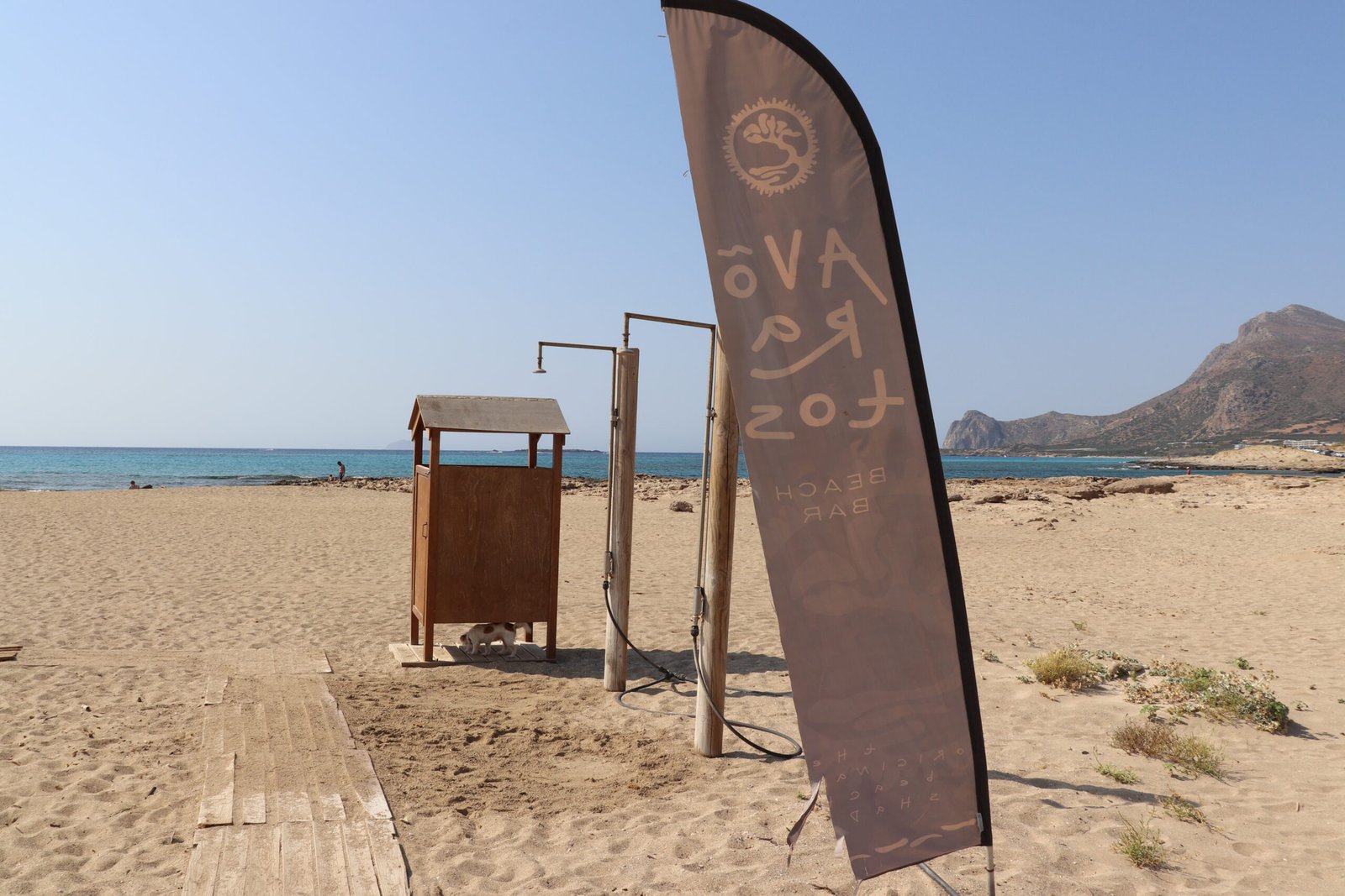 Beach showers and wooden path in front of Avoratos Beach Bar Falassarna
