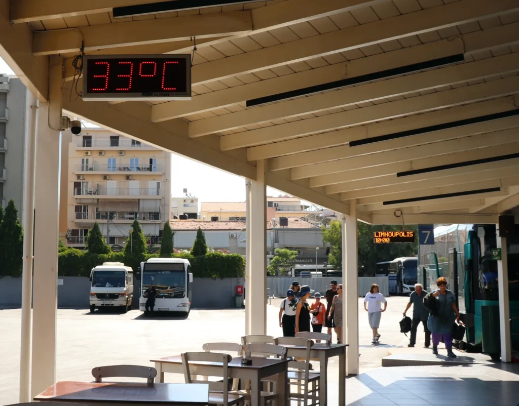 Chania Central Bus Station (KTEL) with buses and passengers boarding regional routes
