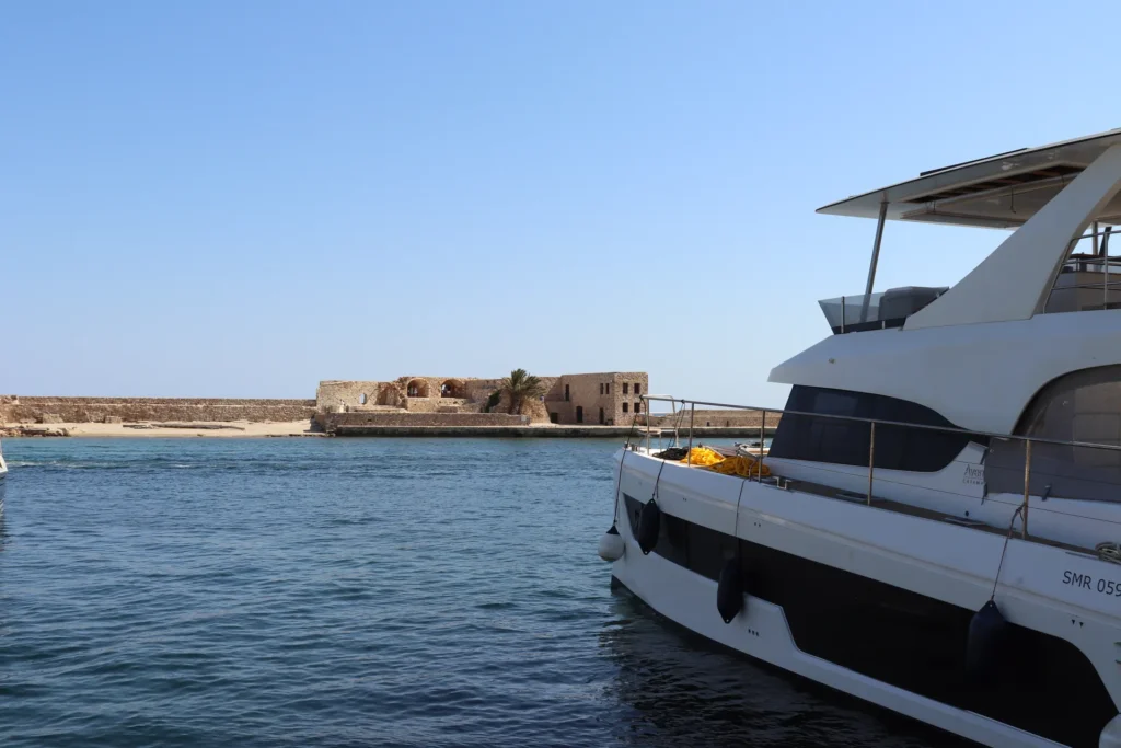 Seafront promenade in Chania Old Harbor near the Venetian Lighthouse