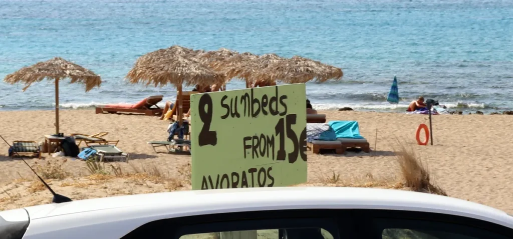 Sunbed price sign at Falassarna Beach in Crete