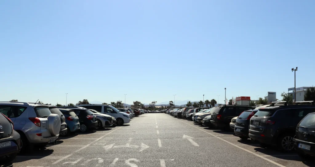 Cars parked at the municipal parking area near Heraklion Airport in Crete