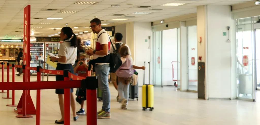 Passenger receiving assistance from airport staff at Heraklion Airport