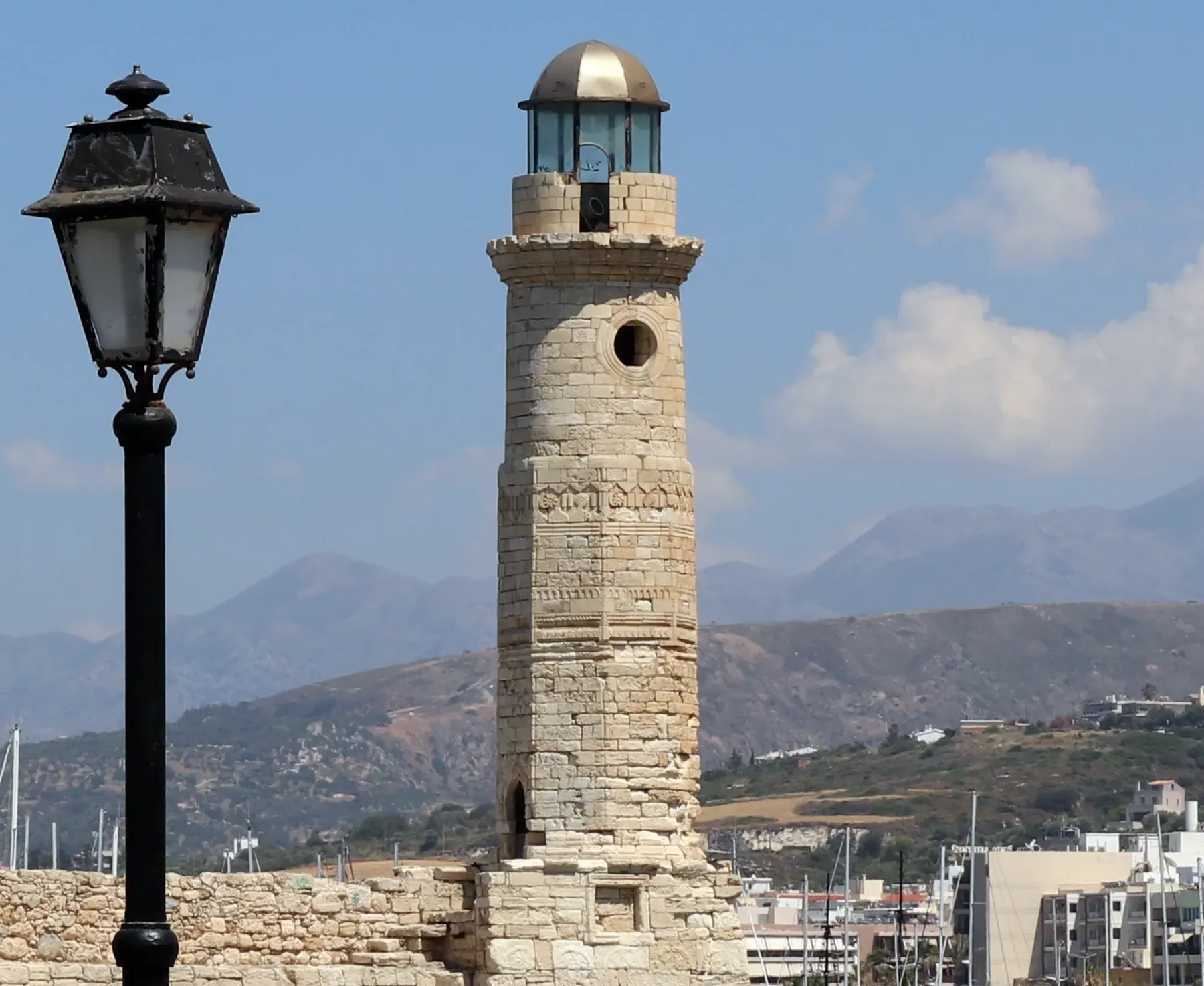 Rethymno lighthouse and Venetian Harbor in daylight