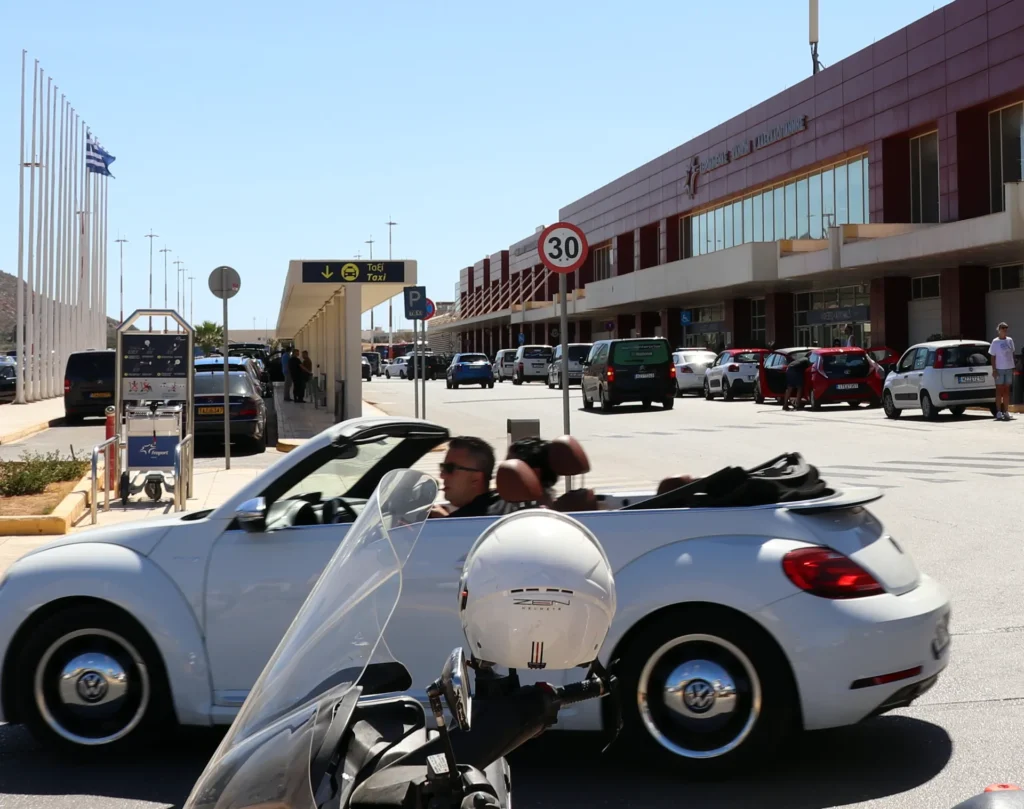 Chania Airport terminal entrance with passenger pickup area