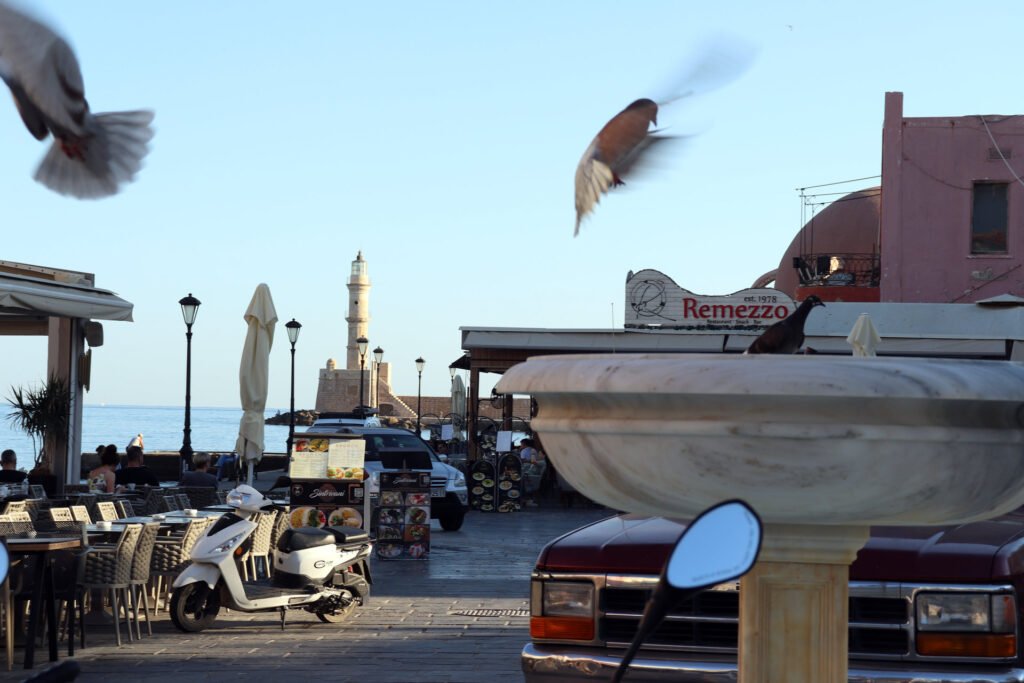 Evening atmosphere at Chania Venetian Harbor in Crete