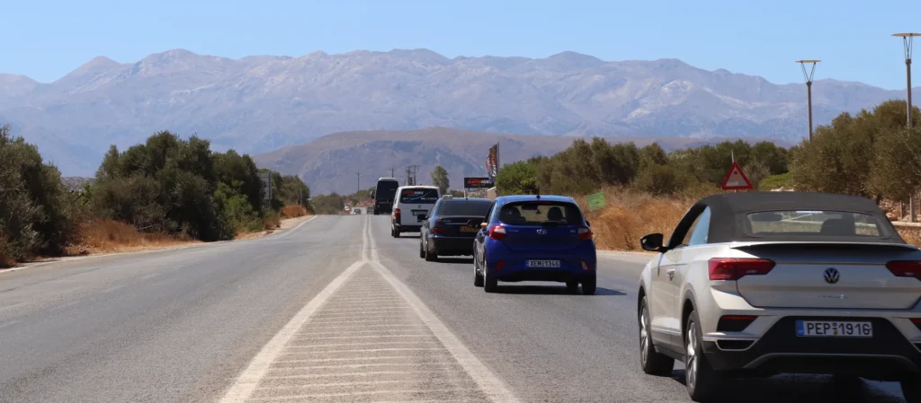 Driving from Chania Airport toward Chania with the White Mountains in the background