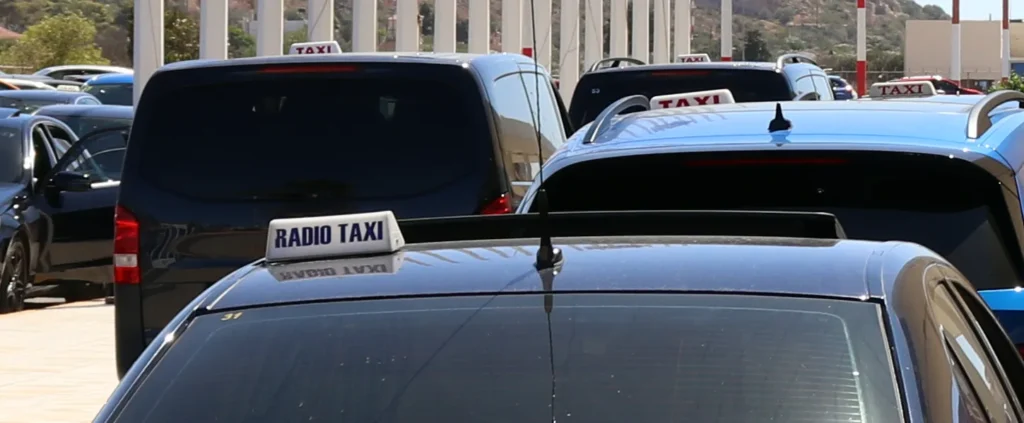 Licensed taxis waiting outside Chania Airport terminal in Crete