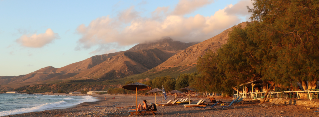 Sunset beach and mountain landscape in Crete Greece
