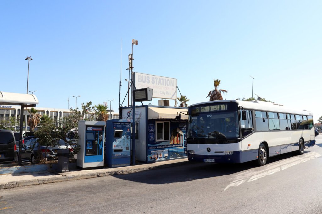 Public bus waiting at the main bus stop outside Heraklion Airport
