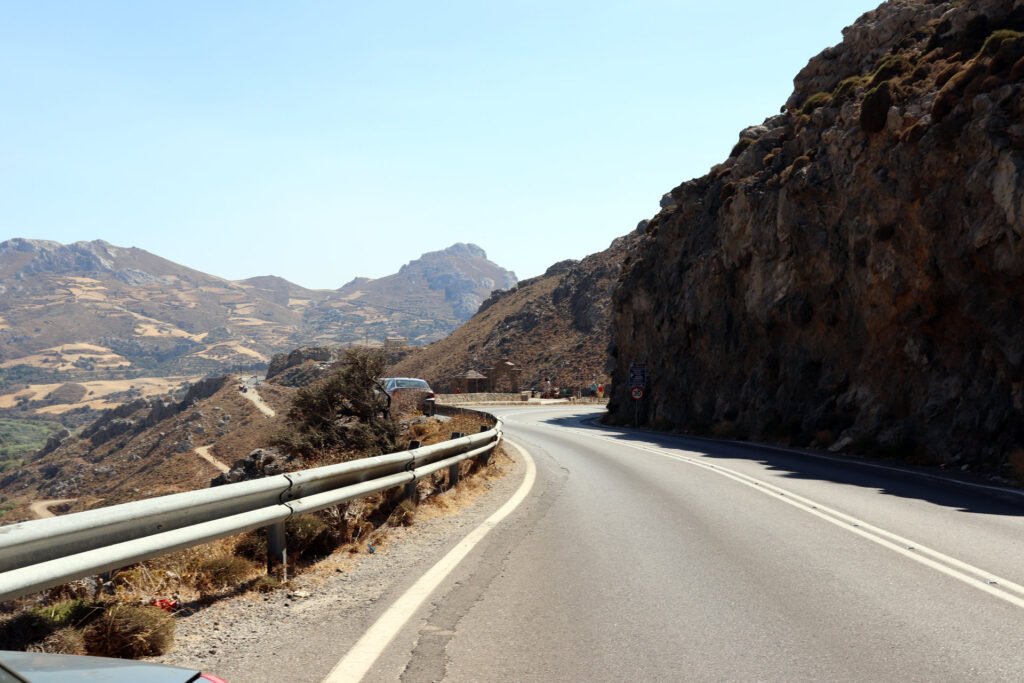 Hidden mountain road in Crete leading through remote landscapes and scenic routes