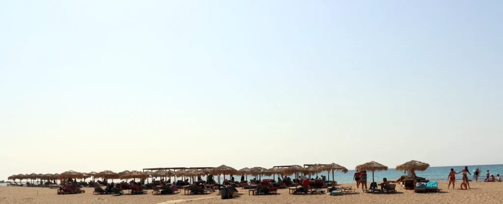 Southern left side of Falassarna Beach with organized sunbeds