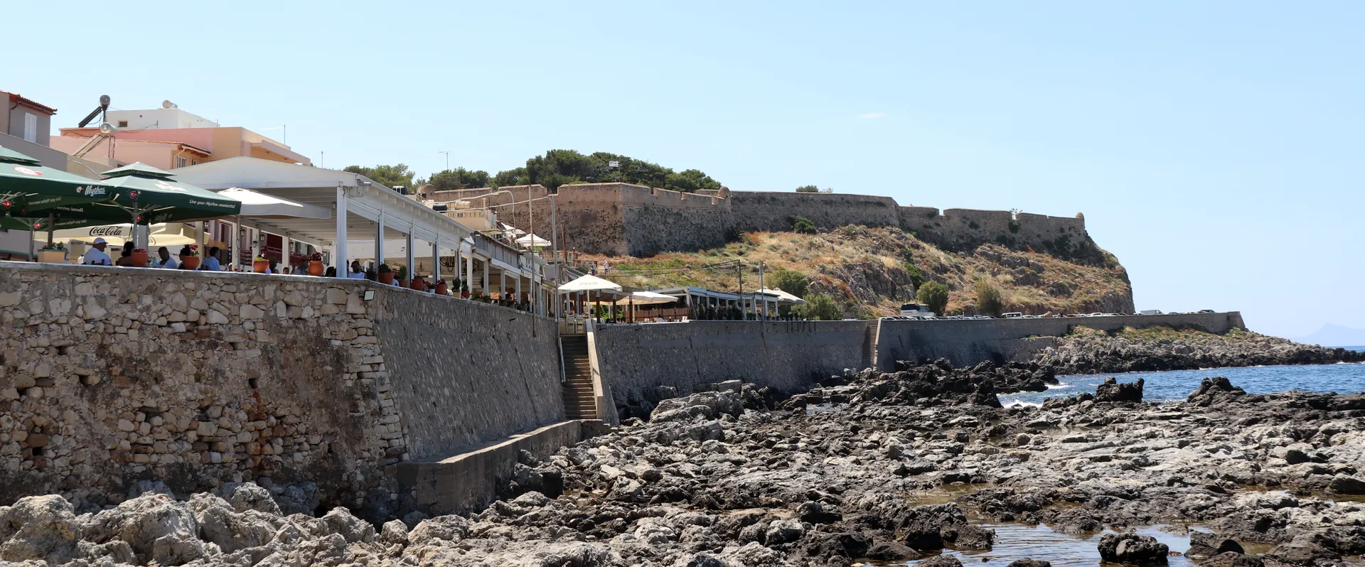 Fortezza and rocky waterfront near Parking Venetian Harbor in Rethymno