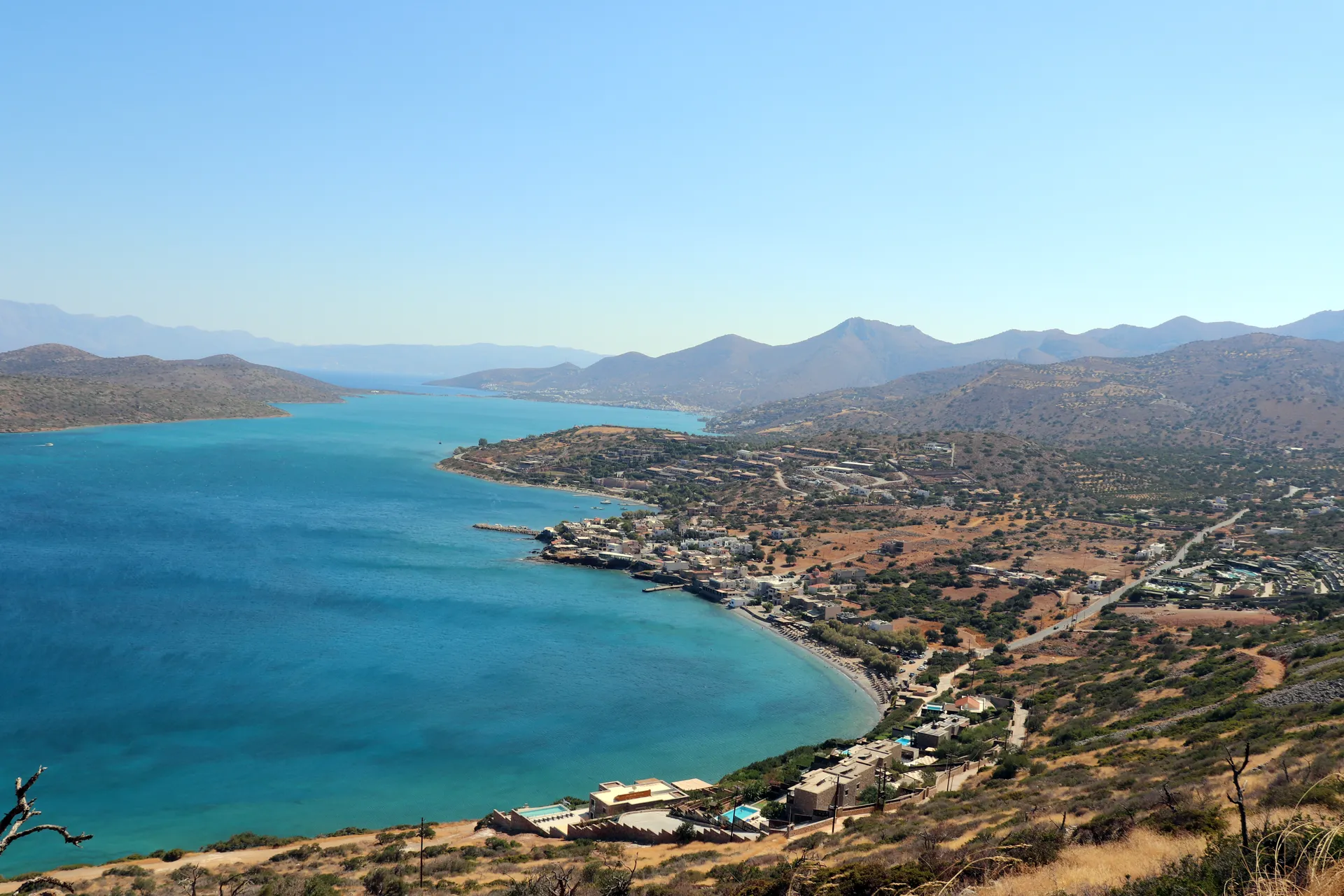 Panoramic view of the coastline and blue water of Mirabello Bay