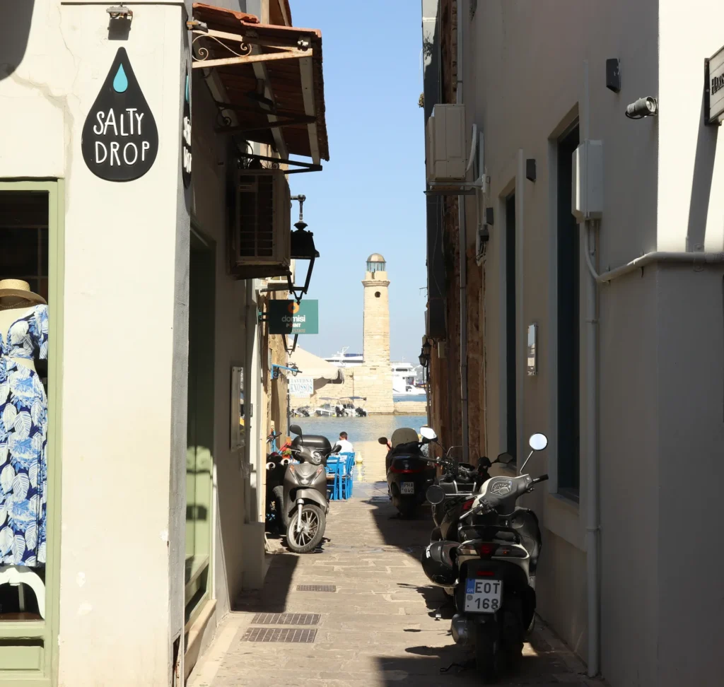 Rethymno Old Town street with Venetian harbour lighthouse